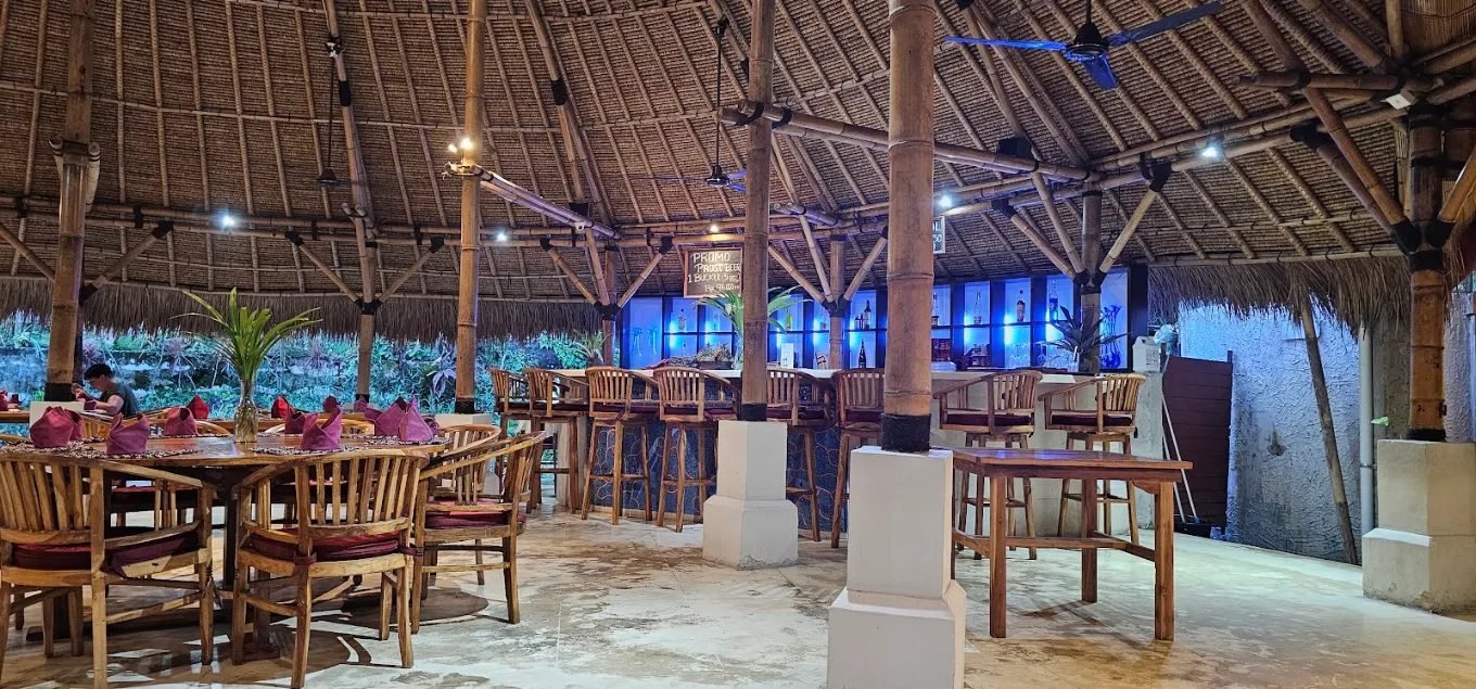 Dining tables and bar at The Dining Room Candidasa